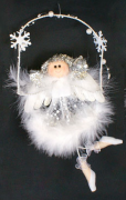Ялинкова прикраса Bon з тканини та пуху Ангел зі сніжинками 18см 199-A81